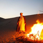 Sunset is such a powerful moment in the desert, and the brushwood fire draws us close as the chilly night arrives.
